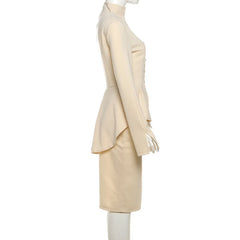 Beige suit on a mannequin against a white background