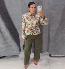 Floral mandarin collar cropped jacket worn with trousers