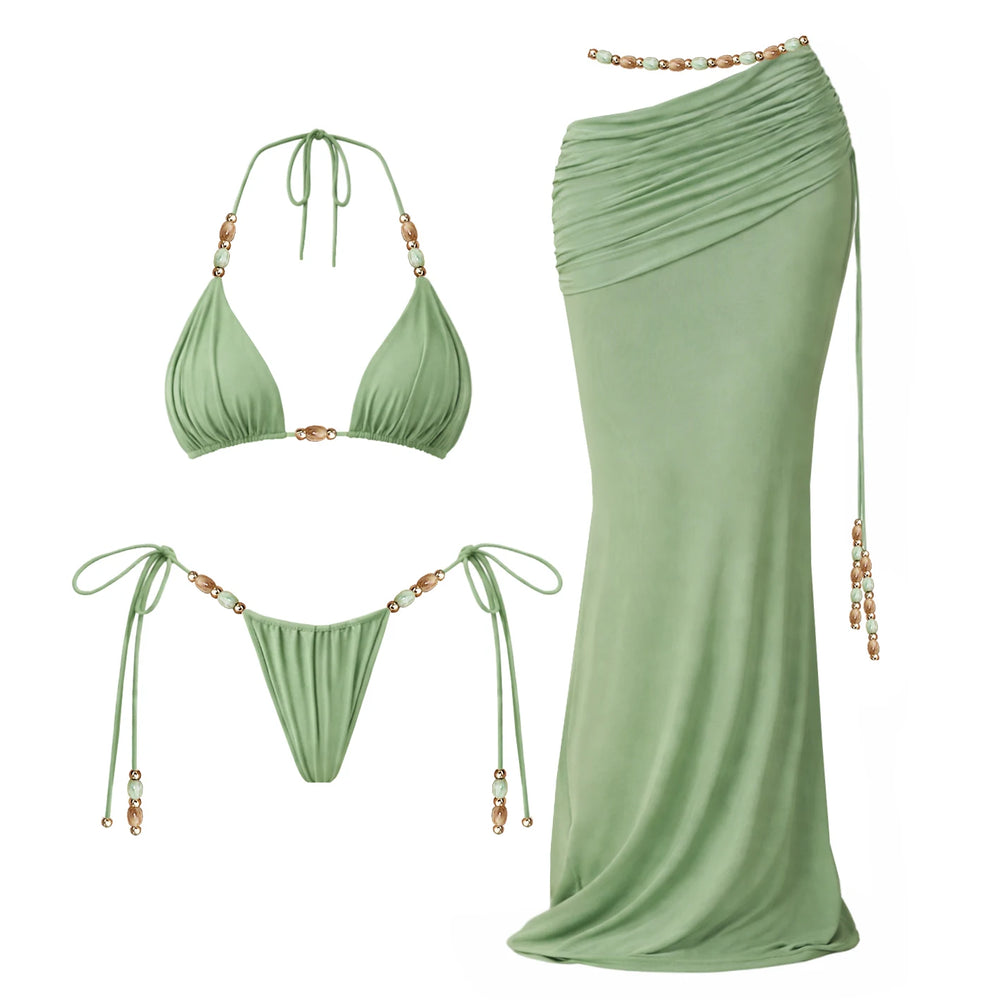 Green bikini and ruched skirt with bead embellishments