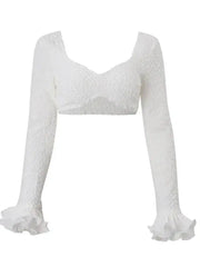 White lace long-sleeve top on a white background