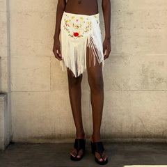 White floral embroidered mini skirt with fringe