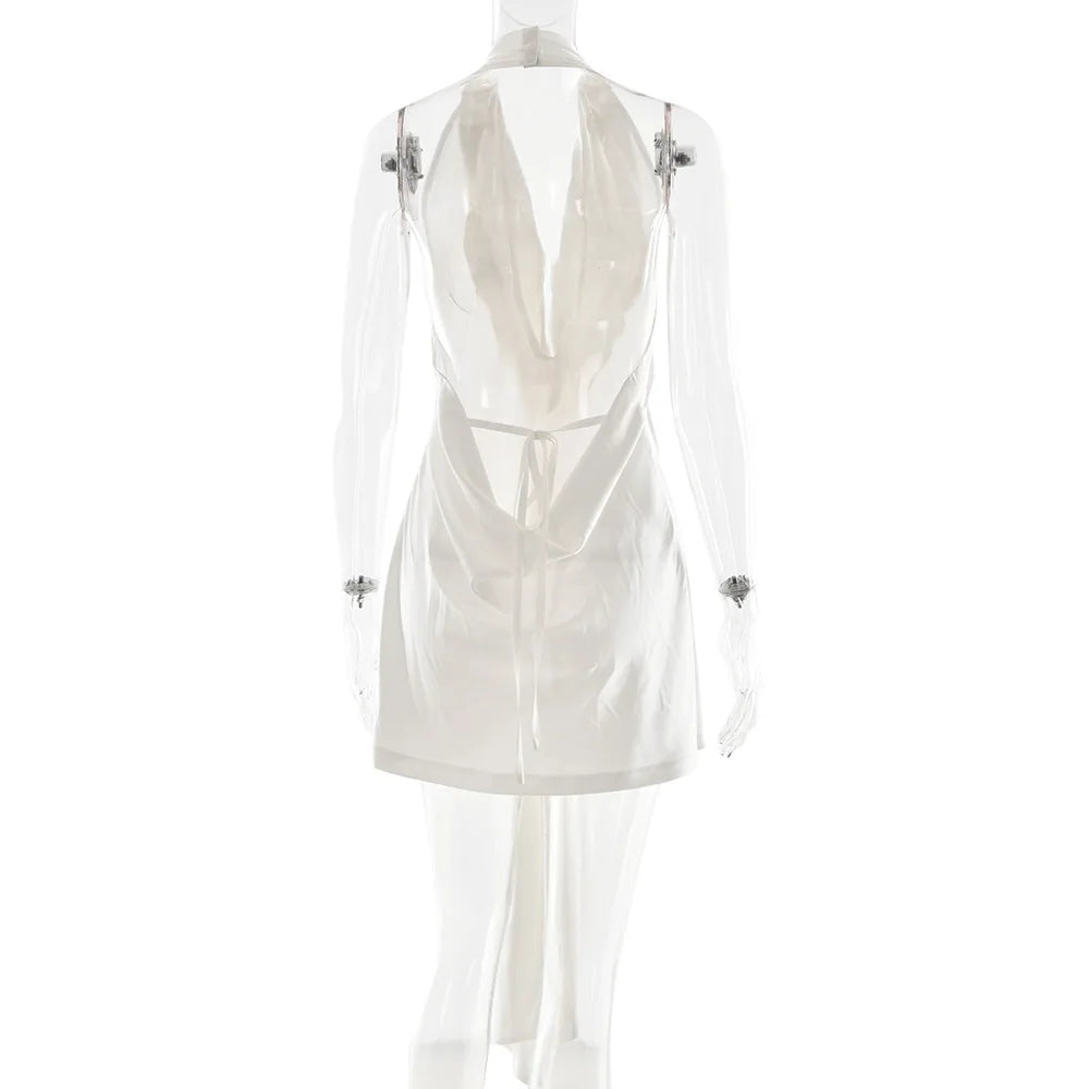 White dress with sheer overlay on a white background