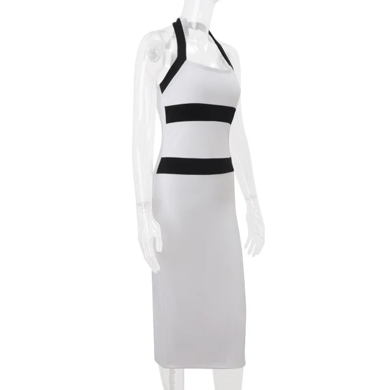 White dress with black stripes on a mannequin