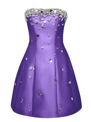 Purple dress with silver embellishments on a white background