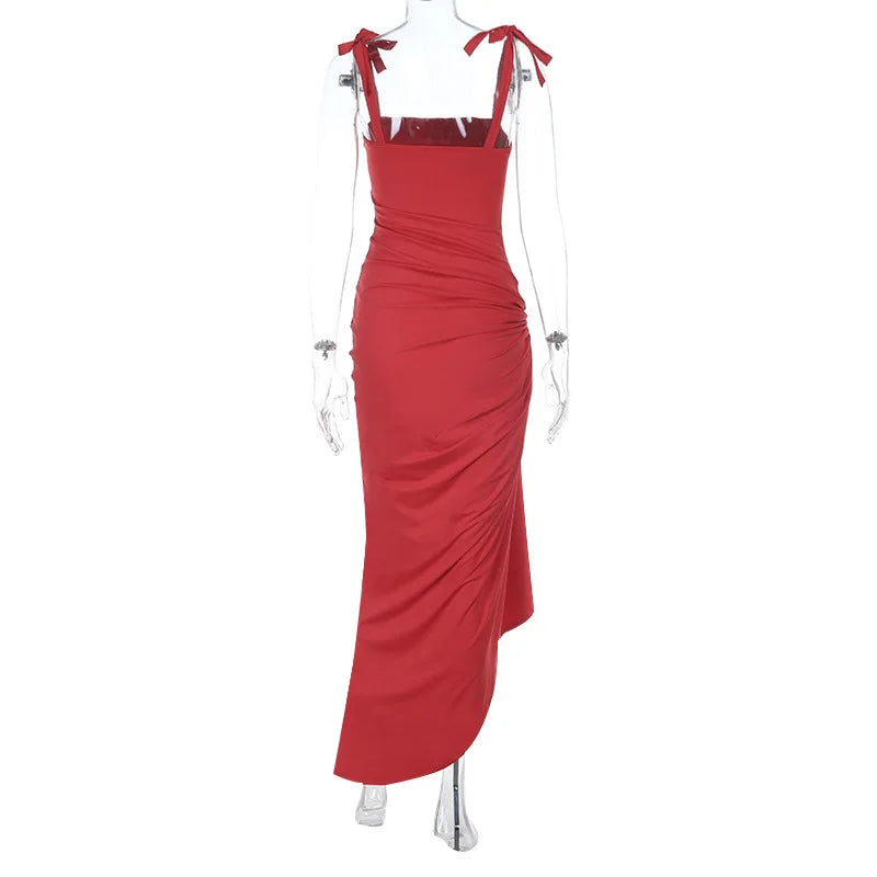 Red evening gown on a mannequin against a white background