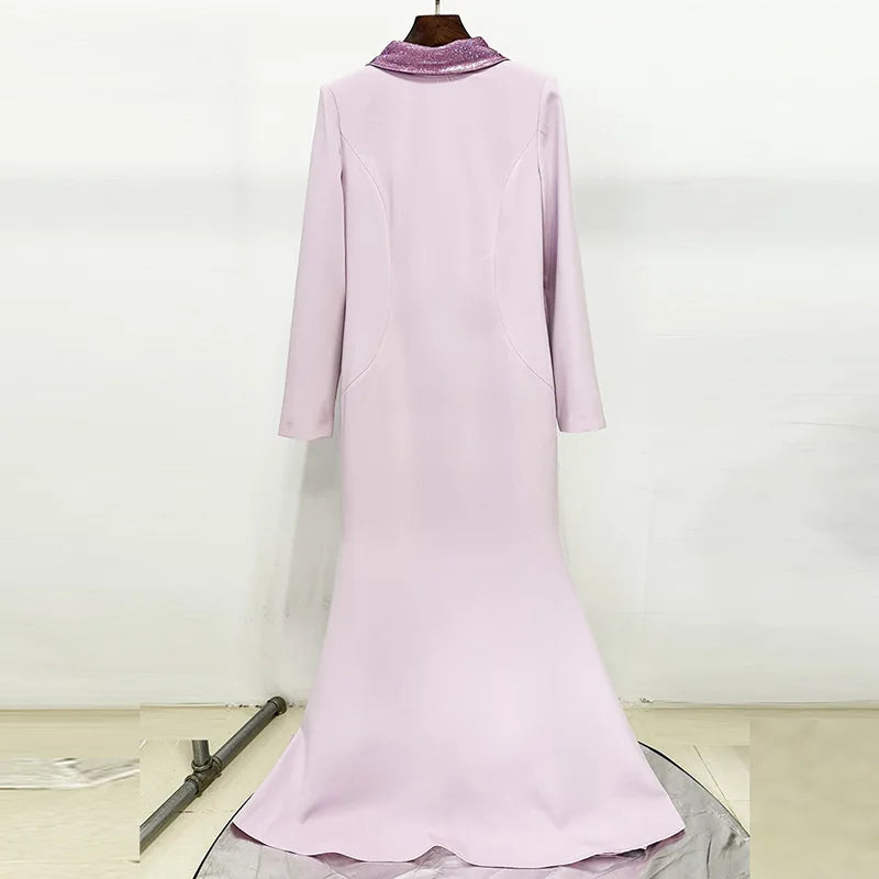 Light purple dress on a mannequin against a white background