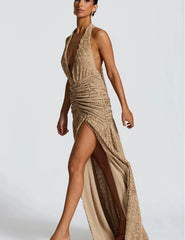 Beige halter neck dress with a slit