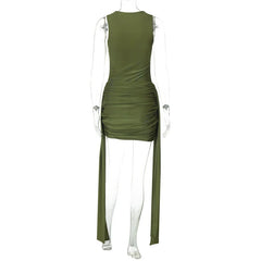 Green dress on a mannequin against a white background