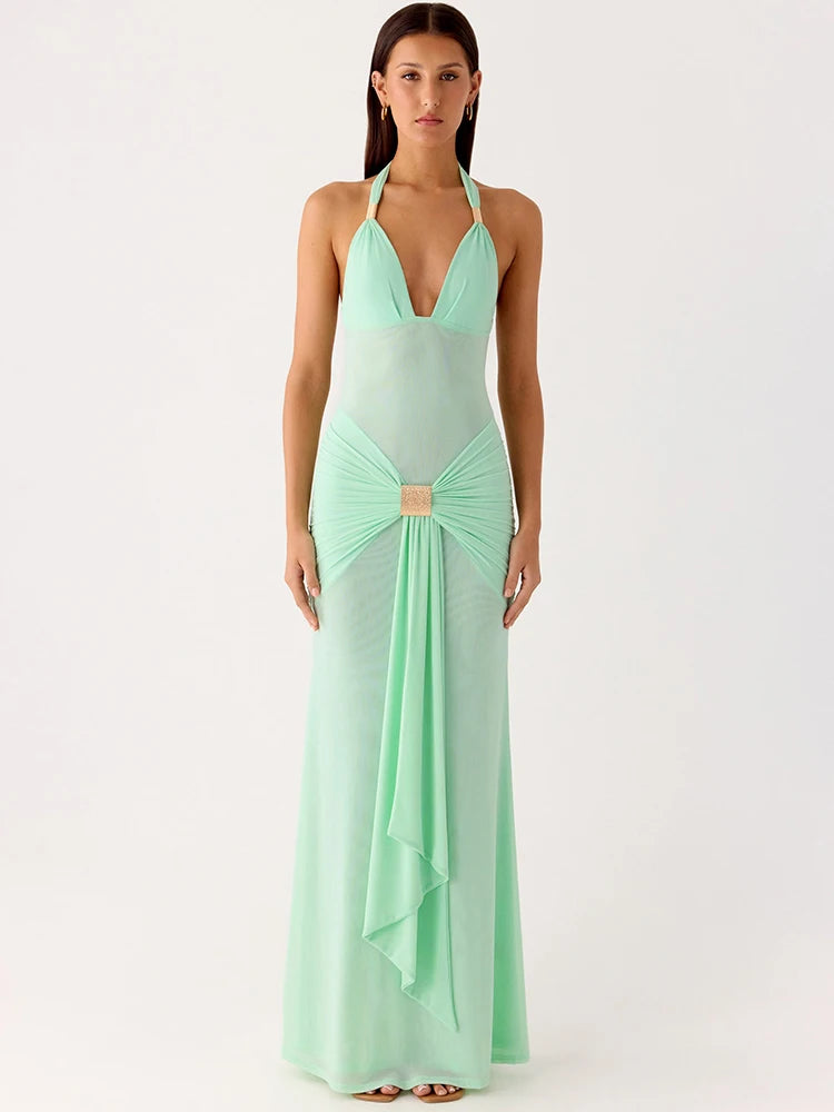 Mint green evening gown with a deep neckline on a white background