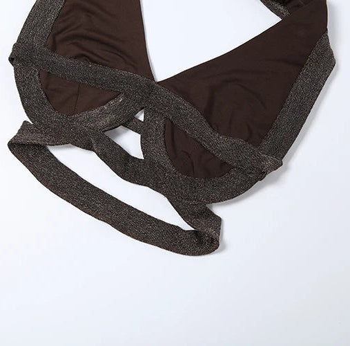 Brown fabric with criss-cross straps on a white background