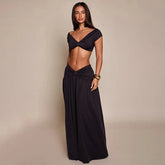 Twisted V-neck crop top with short sleeves and gathered maxi skirt in black