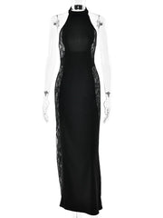 Black evening gown with lace detailing on a mannequin against a white background
