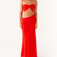 Red strapless gown with cut-out design on a white background