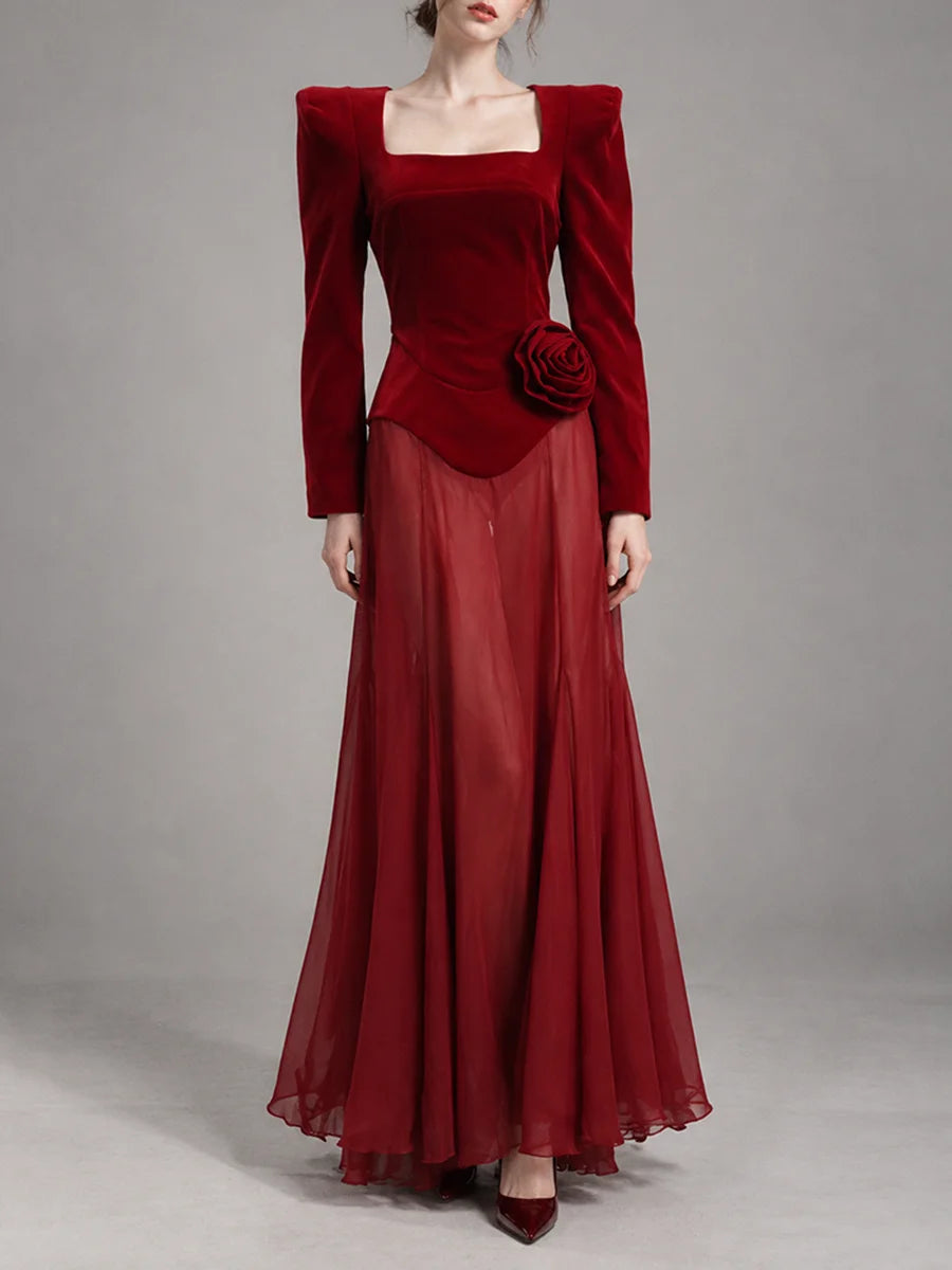 Red velvet maxi dress with a floral accent