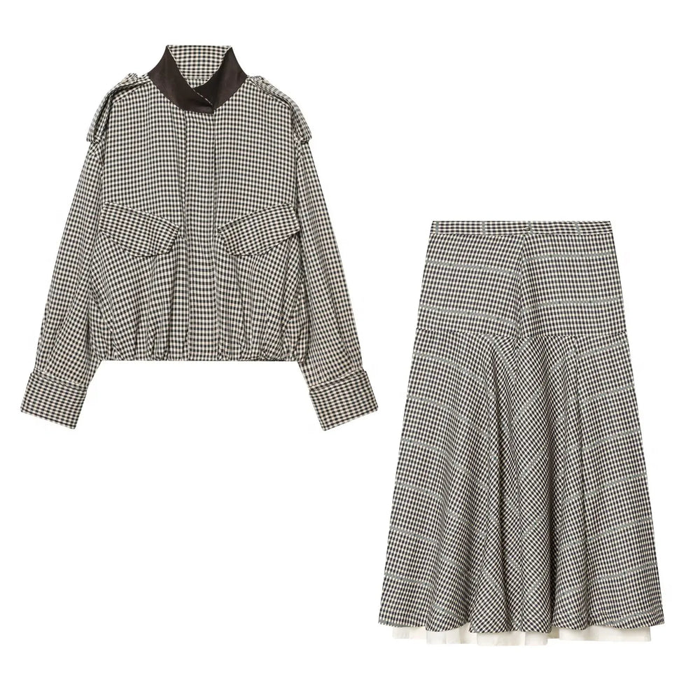 Black and white checkered outfit with jacket and skirt on a white background