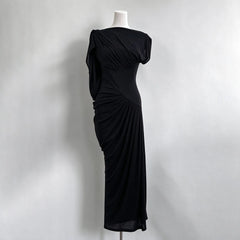Black draped maxi dress on mannequin