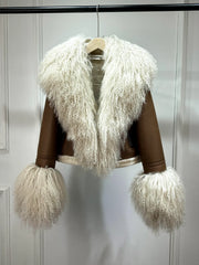 Brown faux leather jacket with white fur collar and cuffs