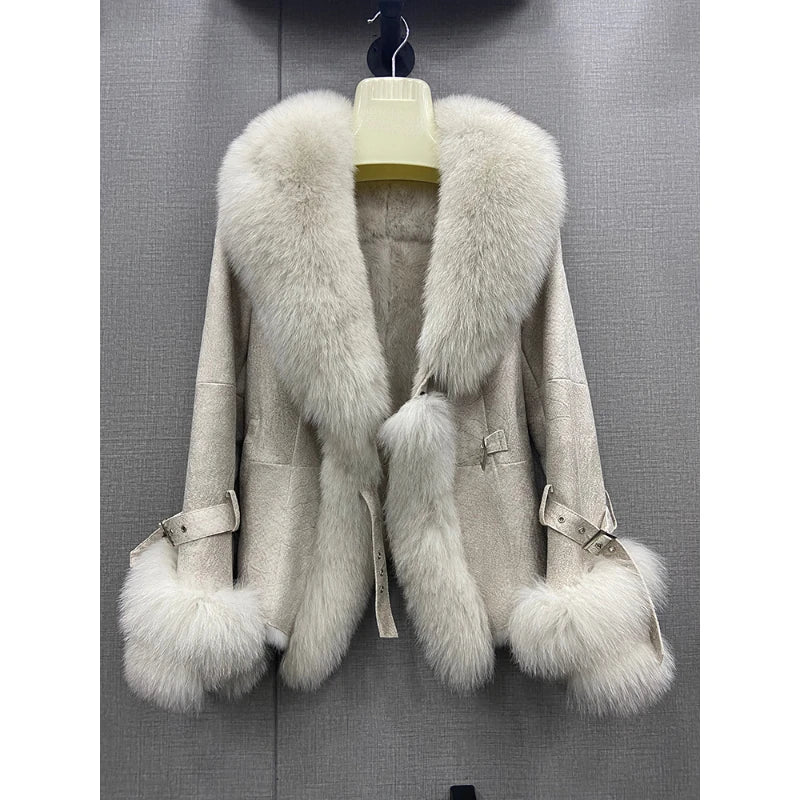 Cream shearling jacket with a natural white fox fur collar and cuffs.