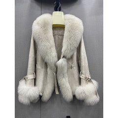 Cream shearling jacket with a natural white fox fur collar and cuffs.