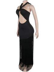 Black evening gown with sheer sides on a mannequin against a white background