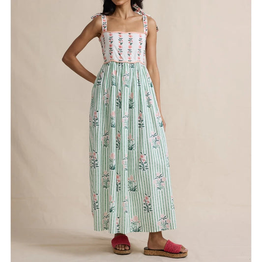 Maxi dress with floral print bodice, green striped skirt, and tie shoulder straps