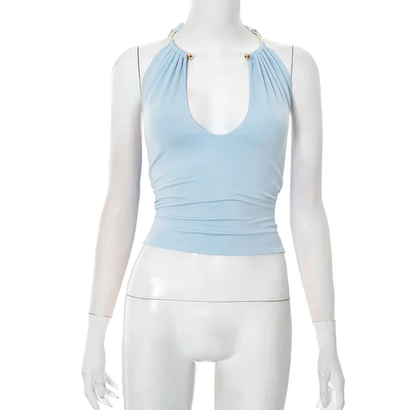 Light blue halter top on a mannequin against a white background