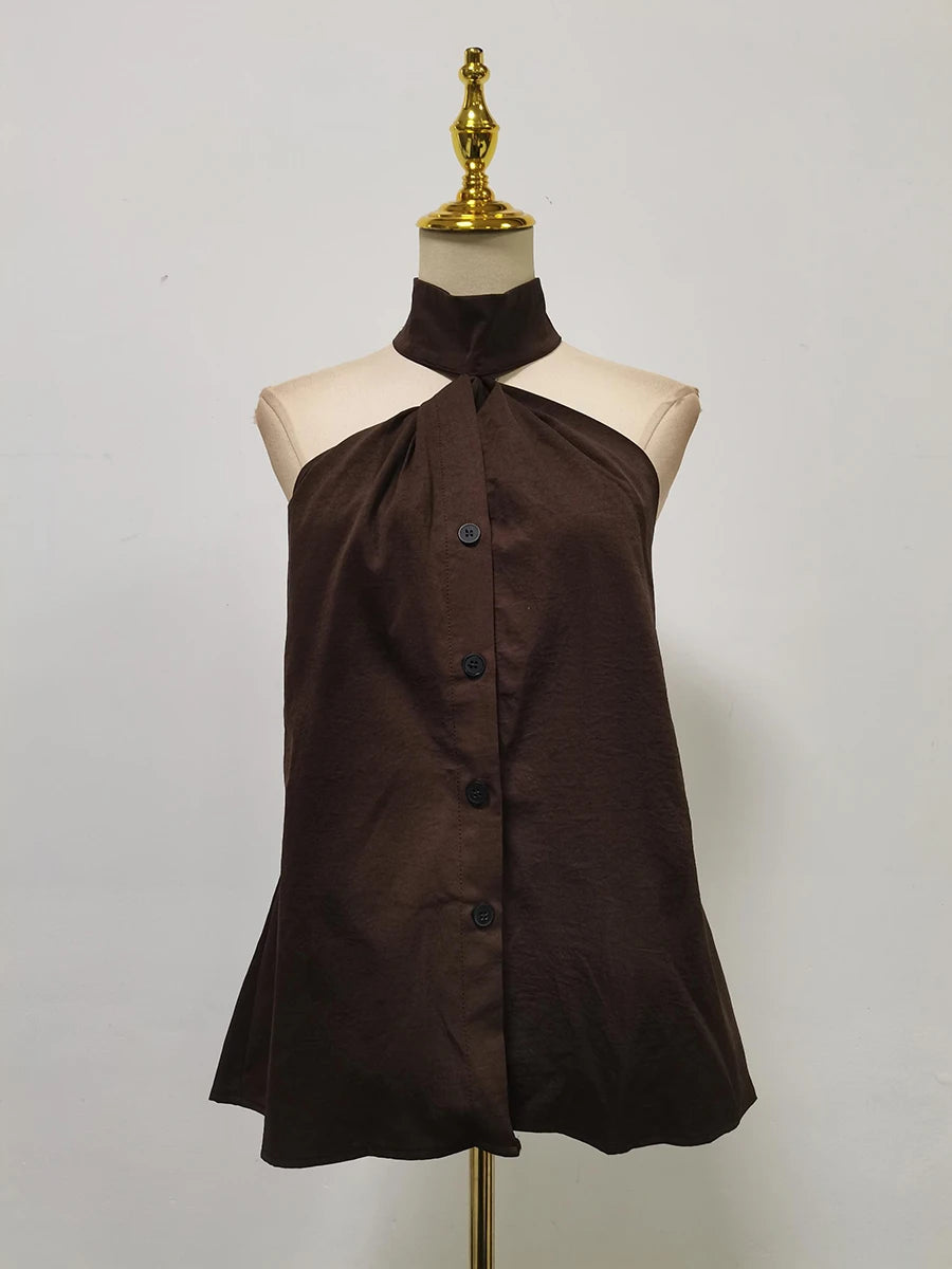 Brown halter top on a mannequin against a plain background