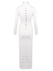 White dress with decorative buttons and embellishments