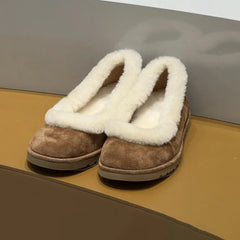 Fleece lined slip on loafers on a surface