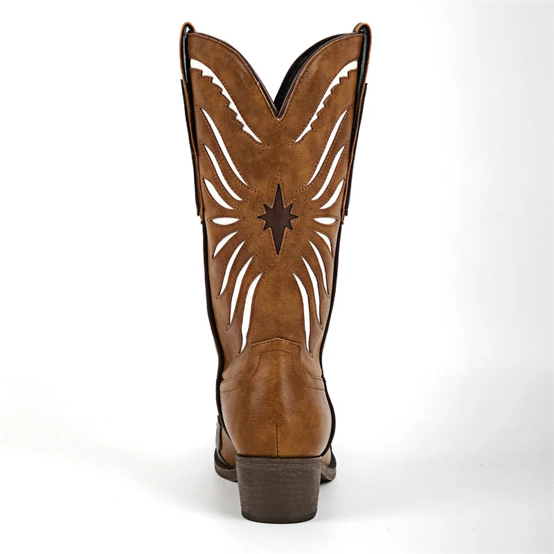 Front view of brown pointed toe cowgirl boots with white embroidery detail