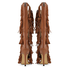 Fringed turquoise studded knee-high boots, detail of fringe and turquoise embellishments