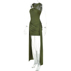 Green dress on a mannequin against a white background