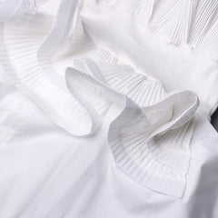 Close-up of a white pleated fabric texture