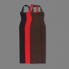 Three dresses in black, red, and brown on a gray background