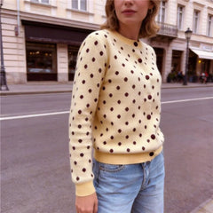 Cream polka dot knit coat street style
