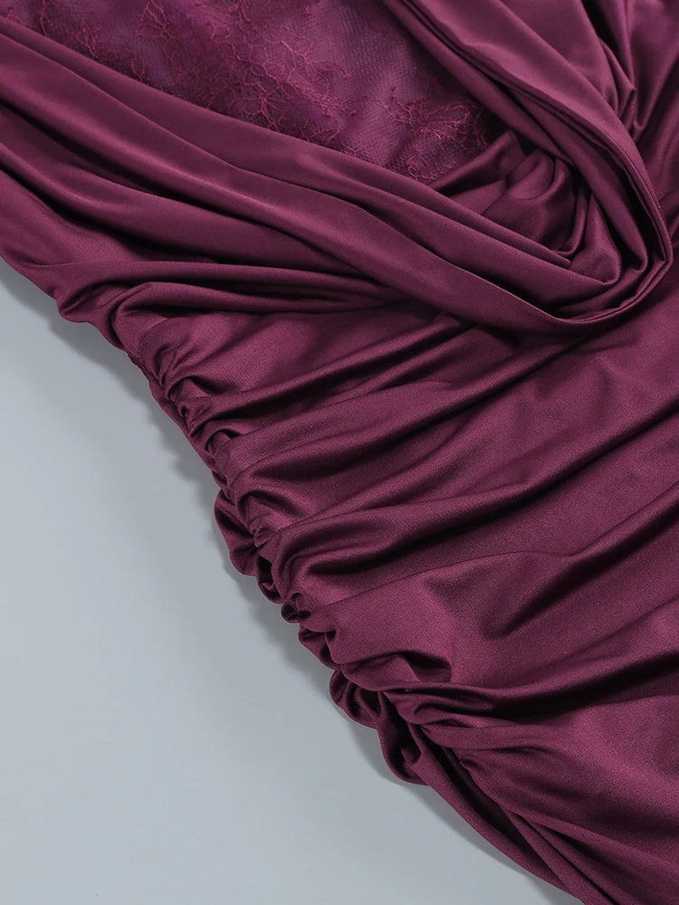 Close-up of burgundy fabric on a light gray background