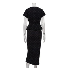 Black polka dot dress on a mannequin