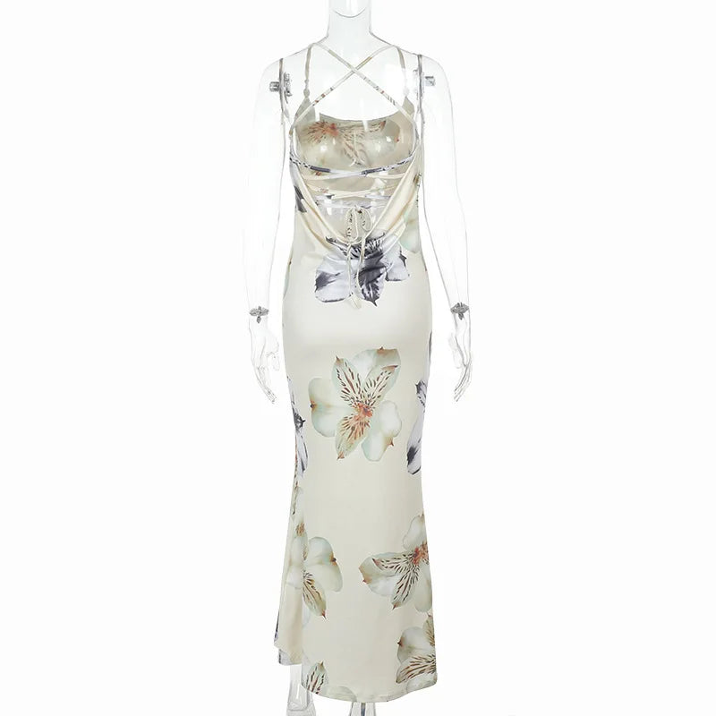 Floral dress on a mannequin against a white background