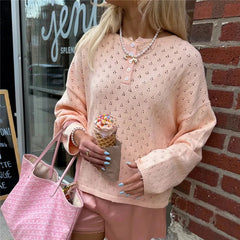 Peach eyelet knit button placket top