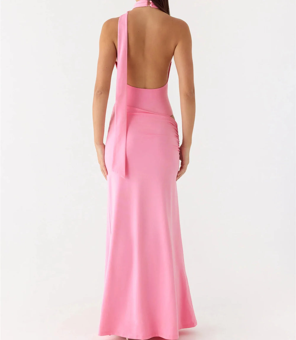 Pink halter neck gown on a white background