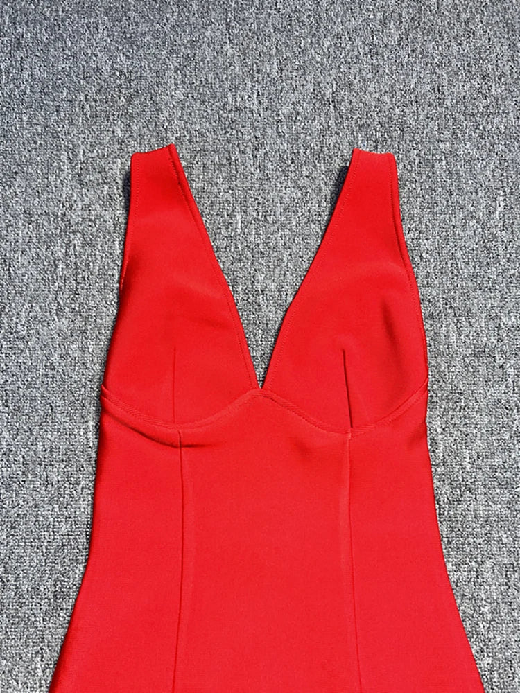 Red dress with a V-neck on a gray textured background