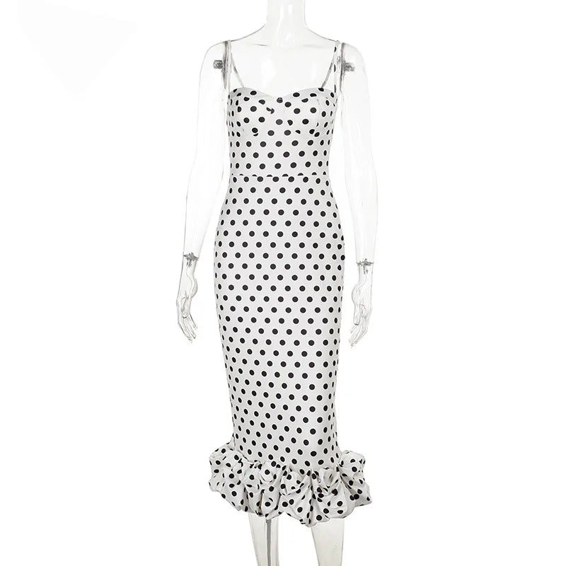 Polka dot dress on a mannequin against a white background