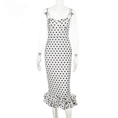Polka dot dress on a mannequin against a white background