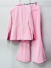 Pink single button blazer and split flare pants hanging from behind