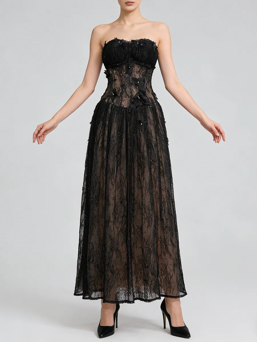 Black lace strapless gown on a white background