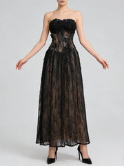 Black lace strapless gown on a white background