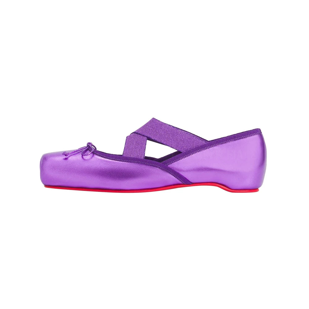 Purple flat shoe with a transparent sole on a white background