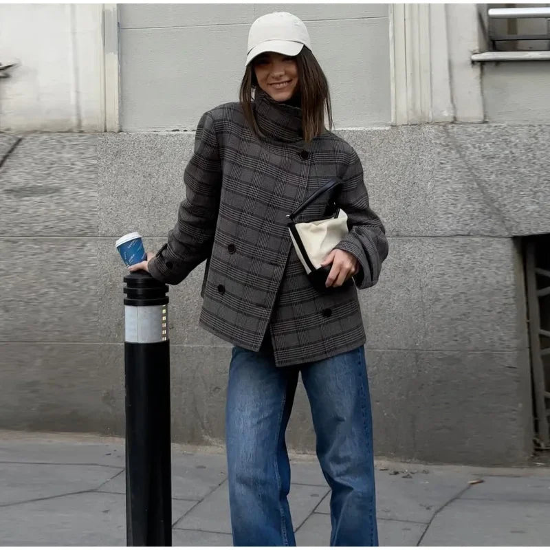 Model wearing a plaid stand collar jacket outdoors