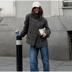 Model wearing a plaid stand collar jacket outdoors