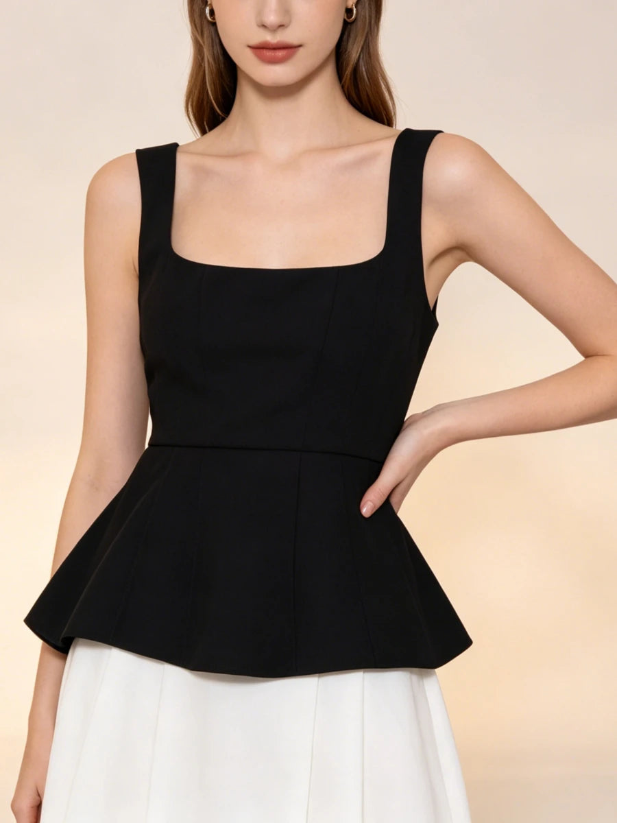 Close-up of a black square neck peplum tank top